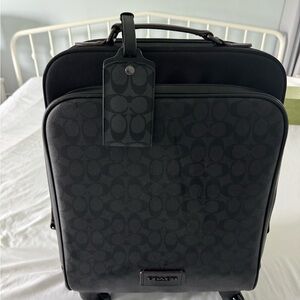 Coach Wheeled Carry on Signature